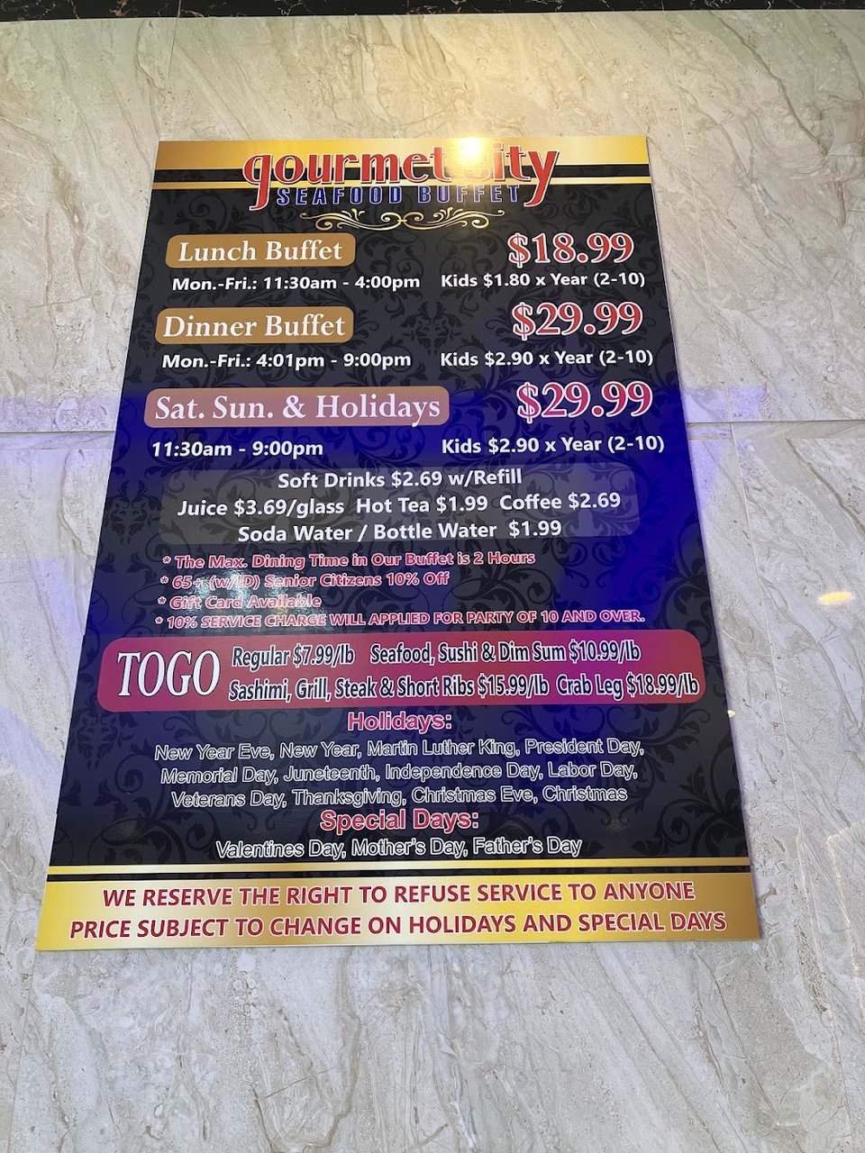Hot stir-fry dishes beside seafood buffet selections.